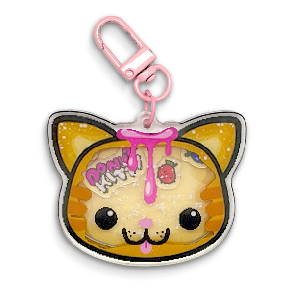Donut Kitty shaker keychain with floating fruit characters inside layered acrylic design